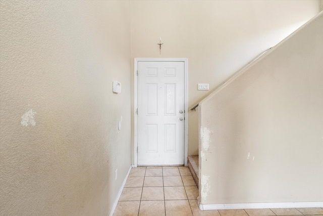 interior space with light tile patterned floors