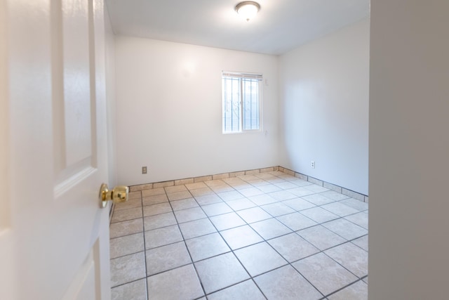 view of tiled spare room