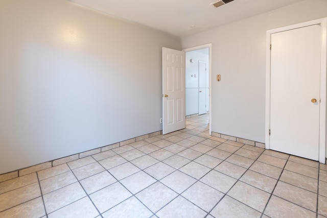 unfurnished bedroom with a closet