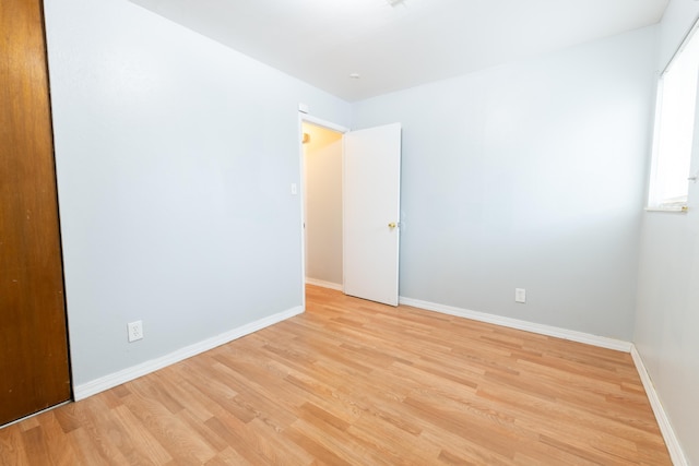 empty room featuring light hardwood / wood-style floors