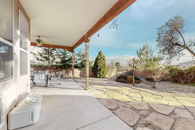 view of patio featuring ceiling fan