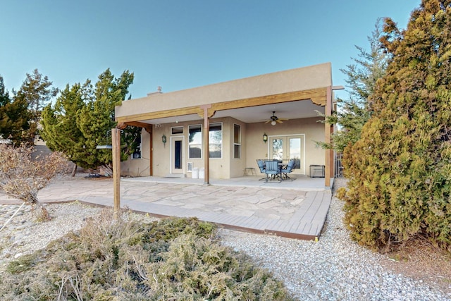 back of house with ceiling fan, a patio area, and french doors