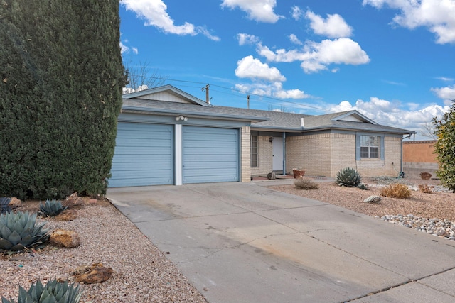 ranch-style home with a garage