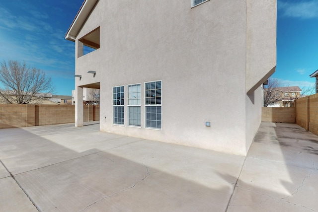 rear view of house featuring a patio area