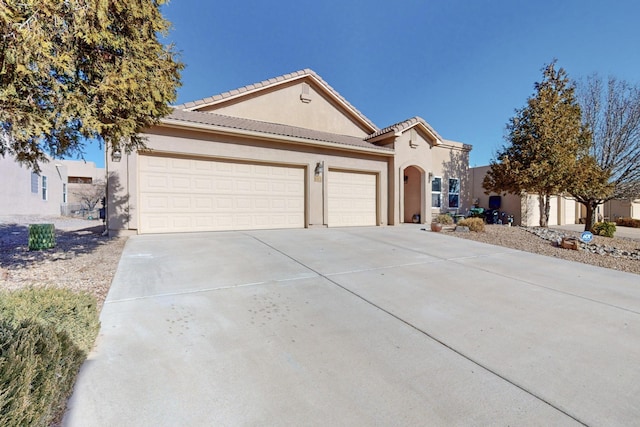 view of front of property featuring a garage