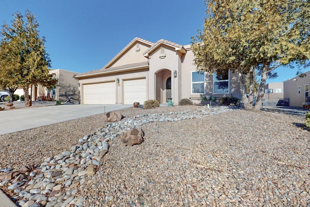 view of front of home with a garage