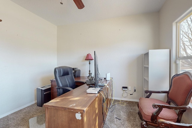 office with carpet flooring and ceiling fan