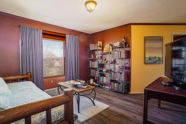 interior space with hardwood / wood-style flooring and ornamental molding