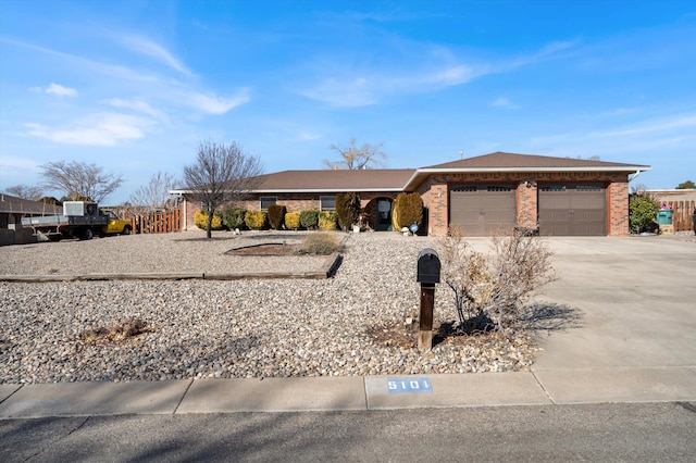 ranch-style home with a garage