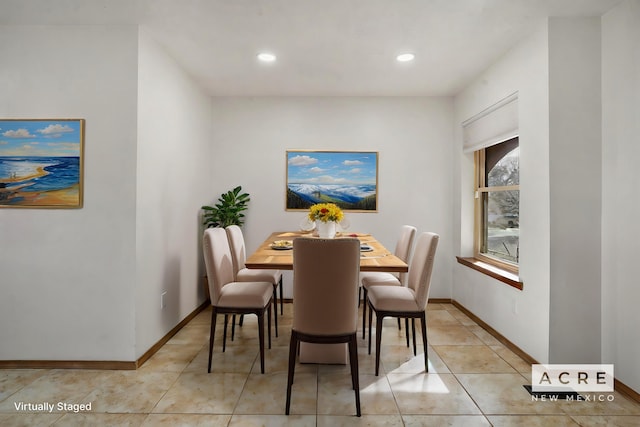 dining room featuring light tile patterned floors