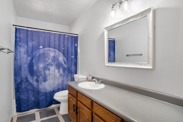 bathroom featuring vanity, a textured ceiling, toilet, and a shower with shower curtain