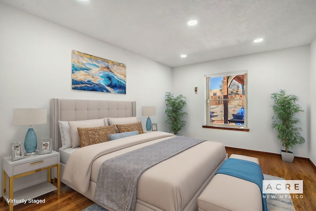 bedroom featuring hardwood / wood-style flooring