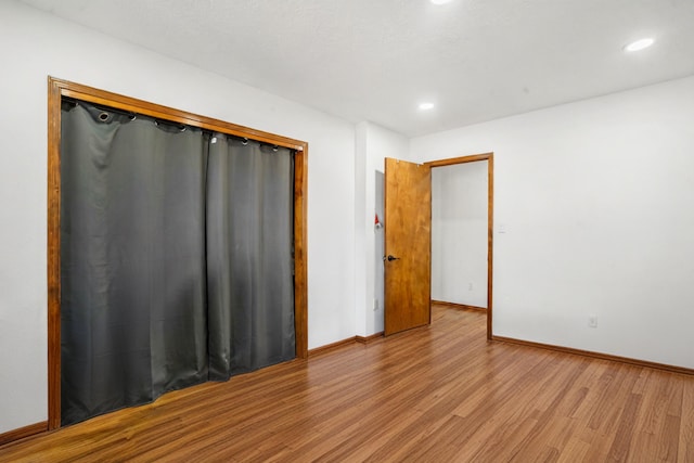 unfurnished room featuring light hardwood / wood-style flooring