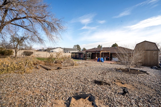 back of house with a patio area