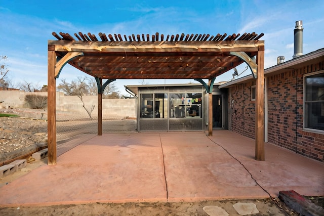 view of patio featuring a pergola