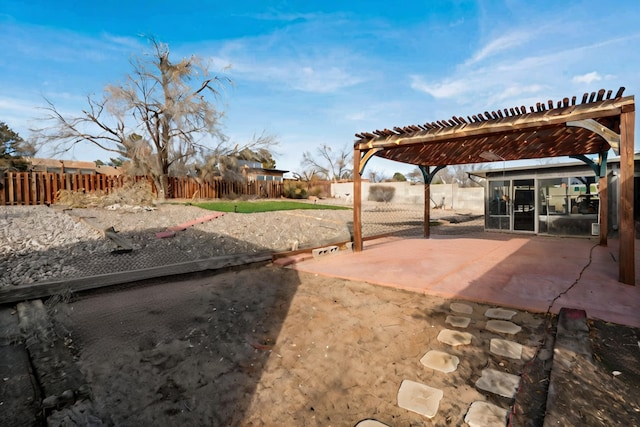 view of yard featuring a pergola and a patio