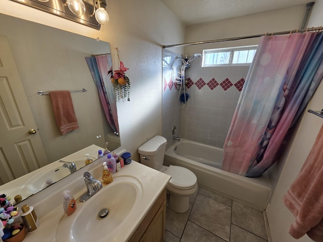 bathroom featuring shower / bath combo with shower curtain, toilet, vanity, and tile patterned flooring