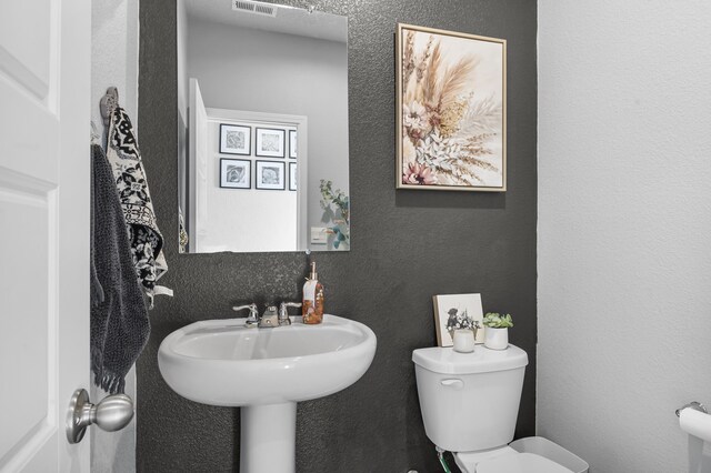 entryway featuring a textured ceiling