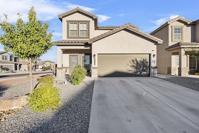 view of front of property with an attached garage, stucco siding, concrete driveway, stone siding, and a tile roof