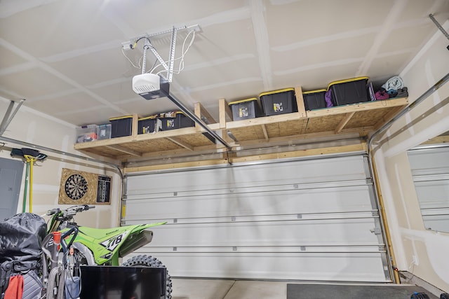 garage featuring a garage door opener