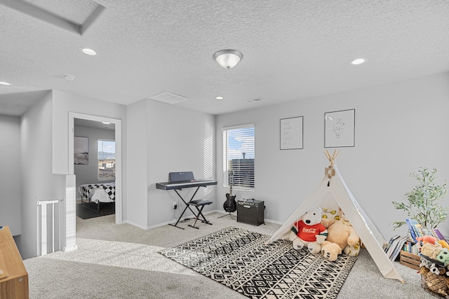 game room with recessed lighting, carpet flooring, baseboards, and visible vents