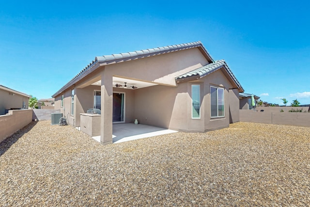 2923 Kings Canyon Loop NE, Rio Rancho, NM 87144 - rear view of property with stucco siding, a fenced backyard, ceiling fan, and a patio