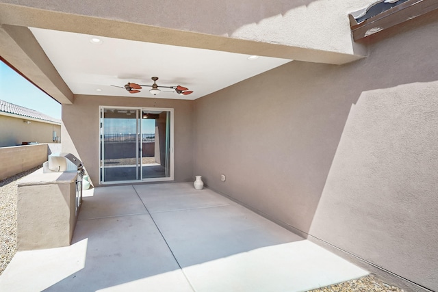 2923 Kings Canyon Loop NE, Rio Rancho, NM 87144 - view of patio with ceiling fan and an outdoor kitchen