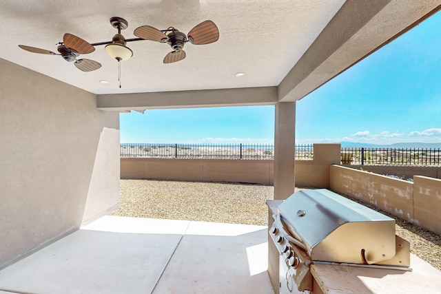 2923 Kings Canyon Loop NE, Rio Rancho, NM 87144 - view of patio / terrace featuring a grill, fence, and a ceiling fan