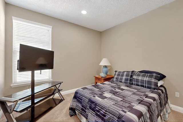 2923 Kings Canyon Loop NE, Rio Rancho, NM 87144 - bedroom with light colored carpet, baseboards, a textured ceiling, and recessed lighting