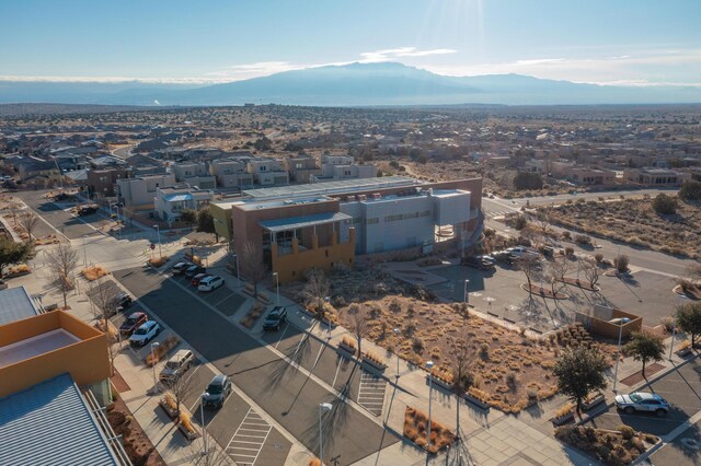 drone / aerial view featuring a mountain view