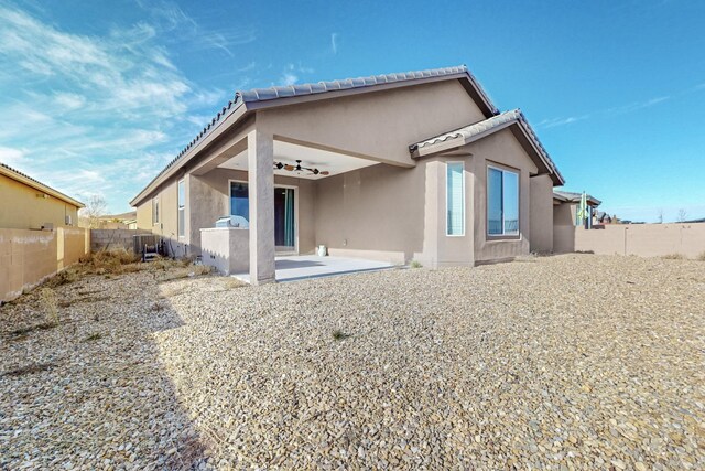 rear view of house featuring a patio area