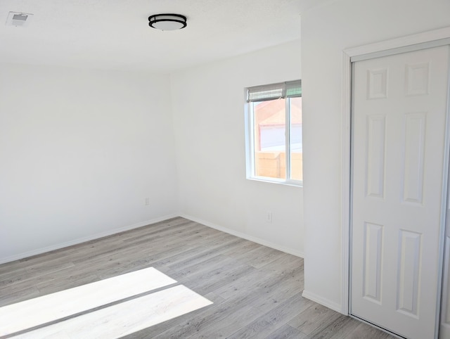 140 65th St NW, Albuquerque, NM 87105 - unfurnished room featuring wood finished floors and baseboards