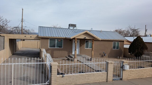 view of front facade featuring a carport