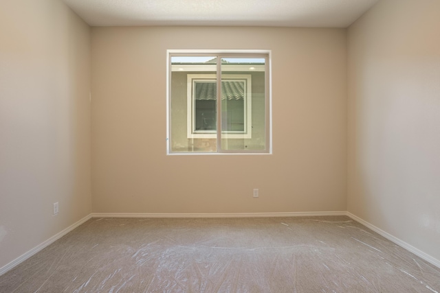 carpeted bedroom featuring a notable chandelier