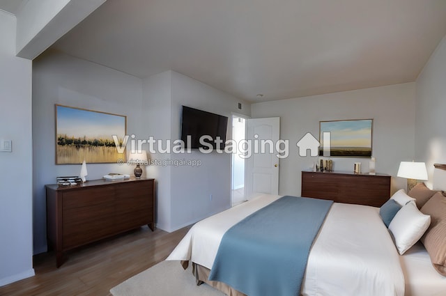 bedroom featuring light hardwood / wood-style flooring