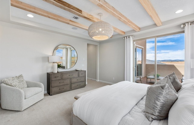 carpeted bedroom featuring access to exterior and beamed ceiling