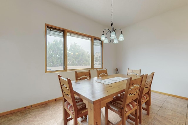 dining space featuring a chandelier