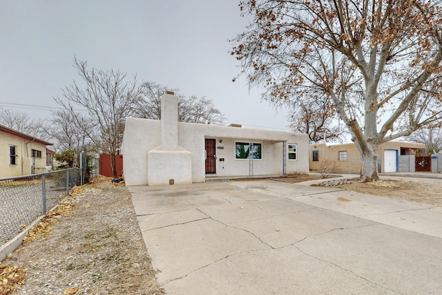 view of adobe home