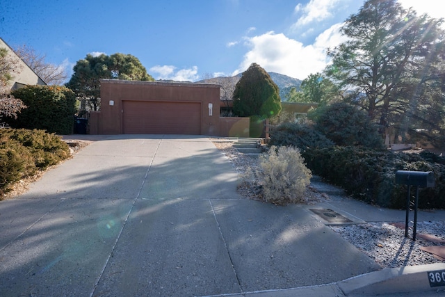 southwest-style home featuring a mountain view