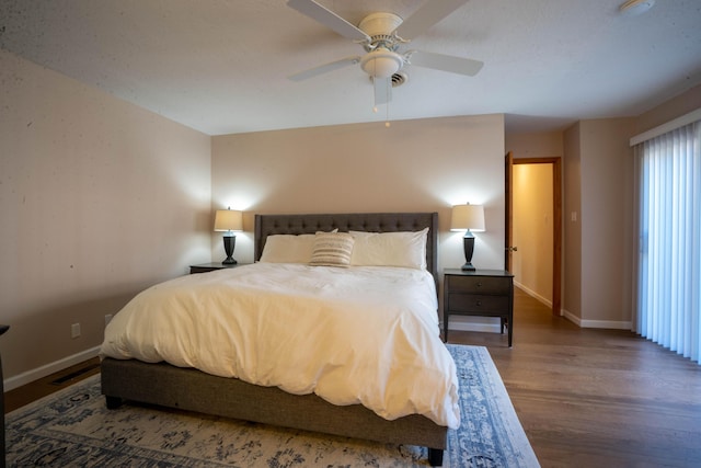 bedroom featuring ceiling fan and hardwood / wood-style floors