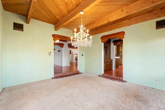 empty room with carpet flooring, wooden ceiling, beamed ceiling, and an inviting chandelier