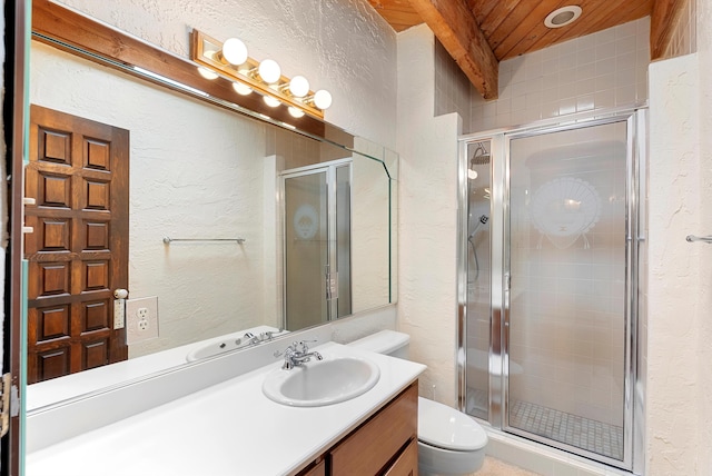 bathroom with beam ceiling, vanity, an enclosed shower, and wooden ceiling