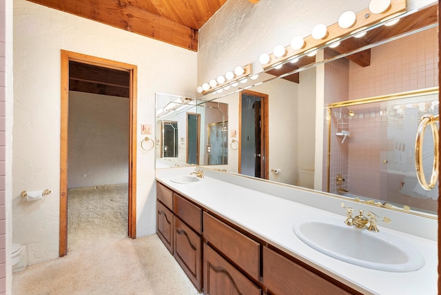 bathroom with vanity, wood ceiling, and walk in shower