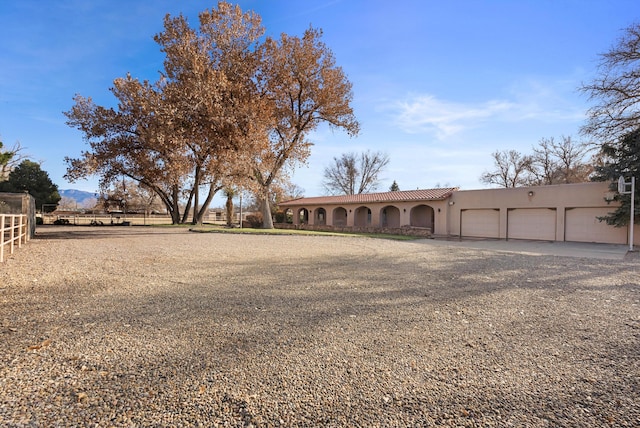 view of yard featuring a garage