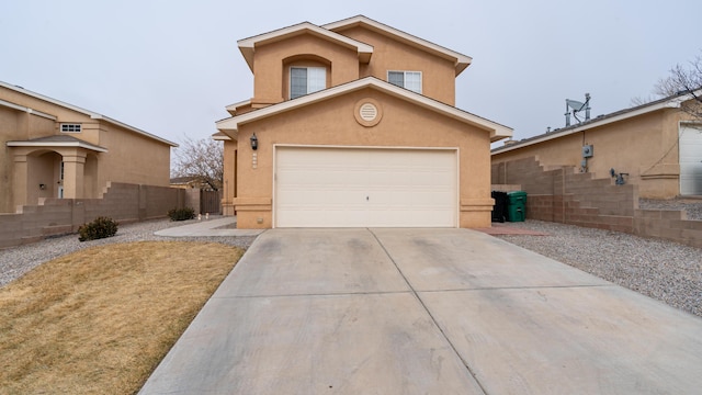 view of front of property featuring a garage