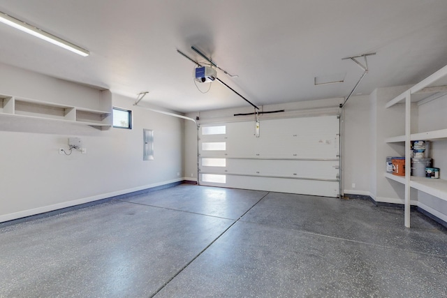 garage with electric panel and a garage door opener