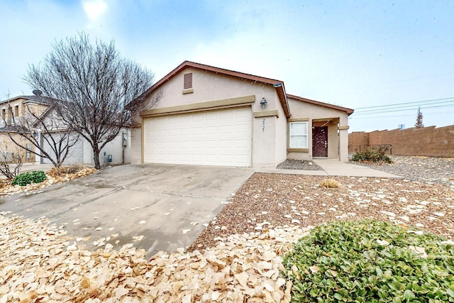 single story home featuring a garage