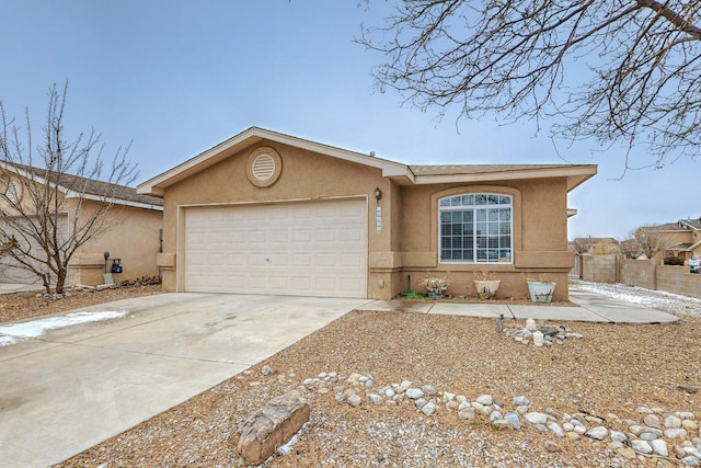 ranch-style home featuring a garage