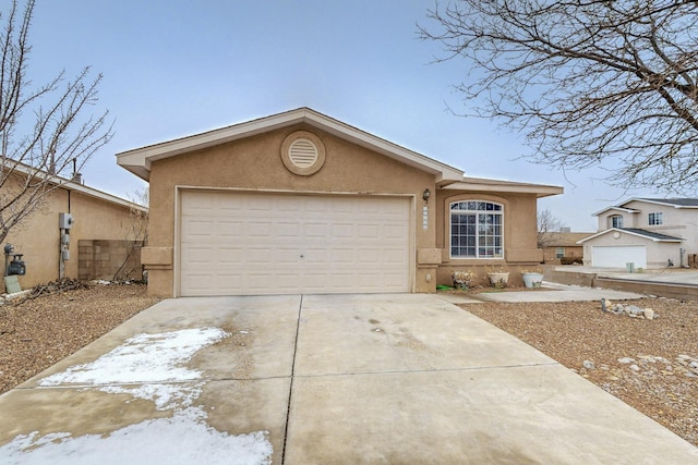 single story home featuring a garage