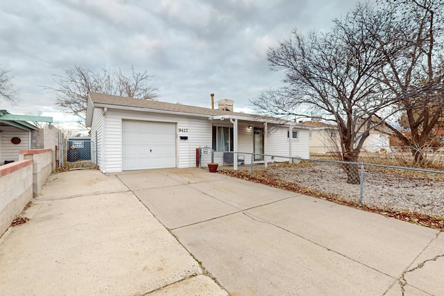 single story home featuring a garage